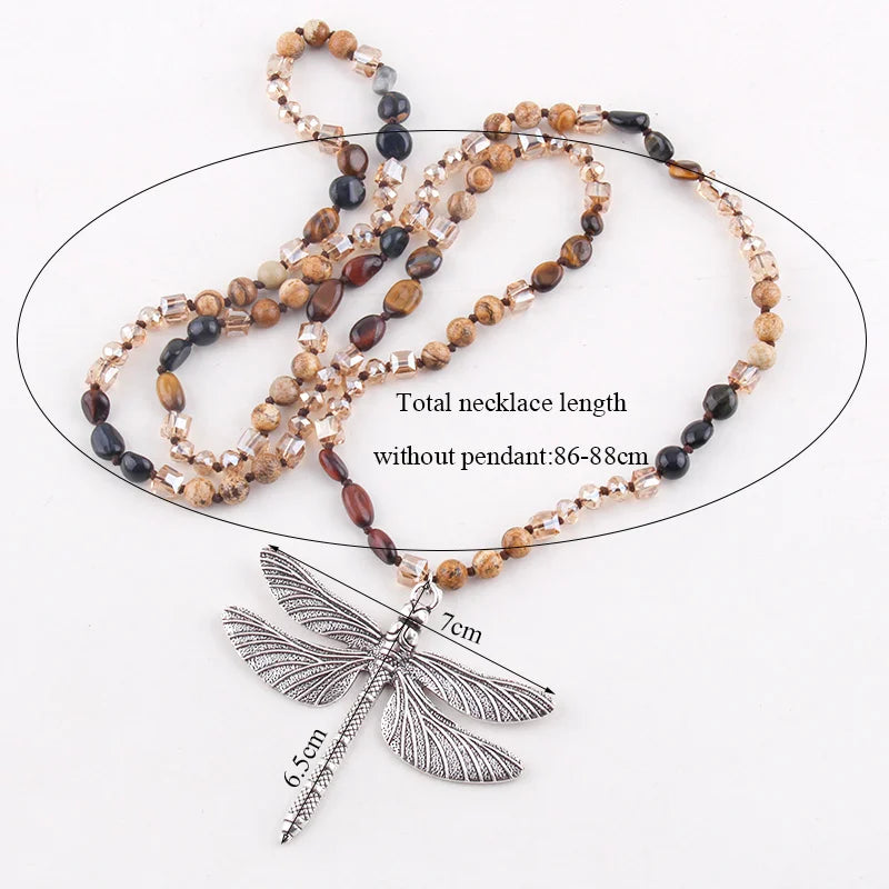 Necklace with dragonfly pendant and measurement details on a white background
