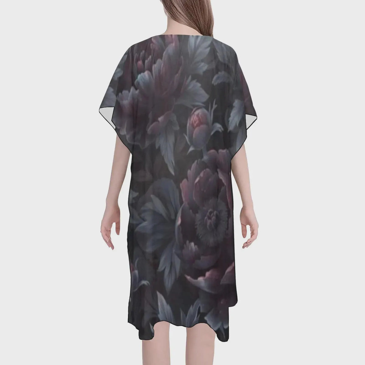 Floral patterned dress on a white background