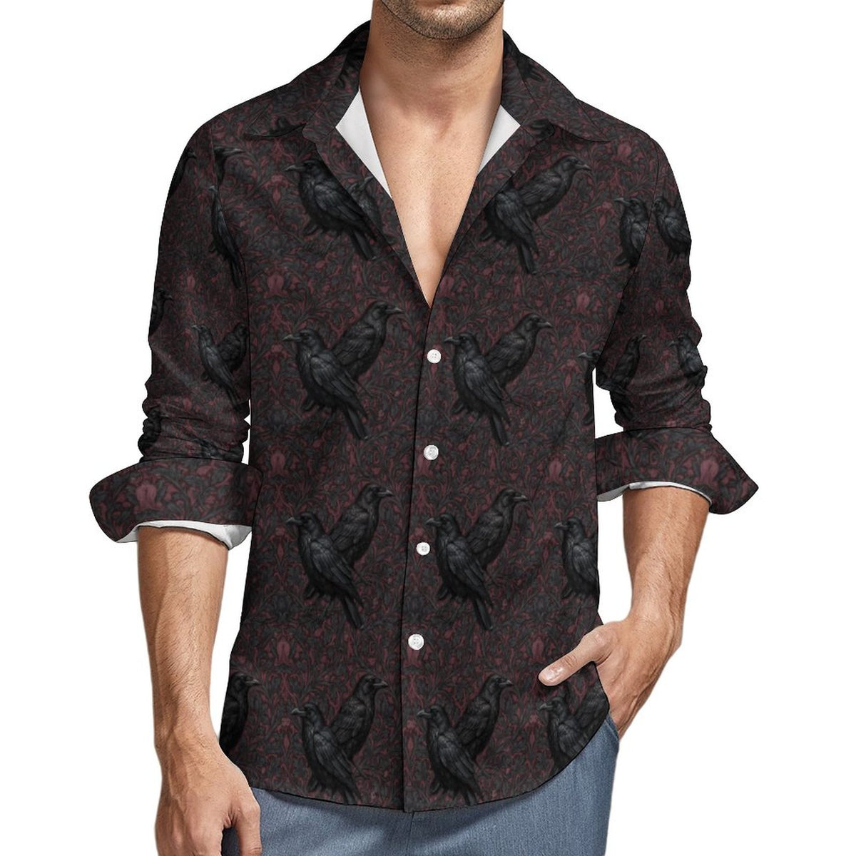 Man wearing a dark shirt with black crow pattern on a white background
